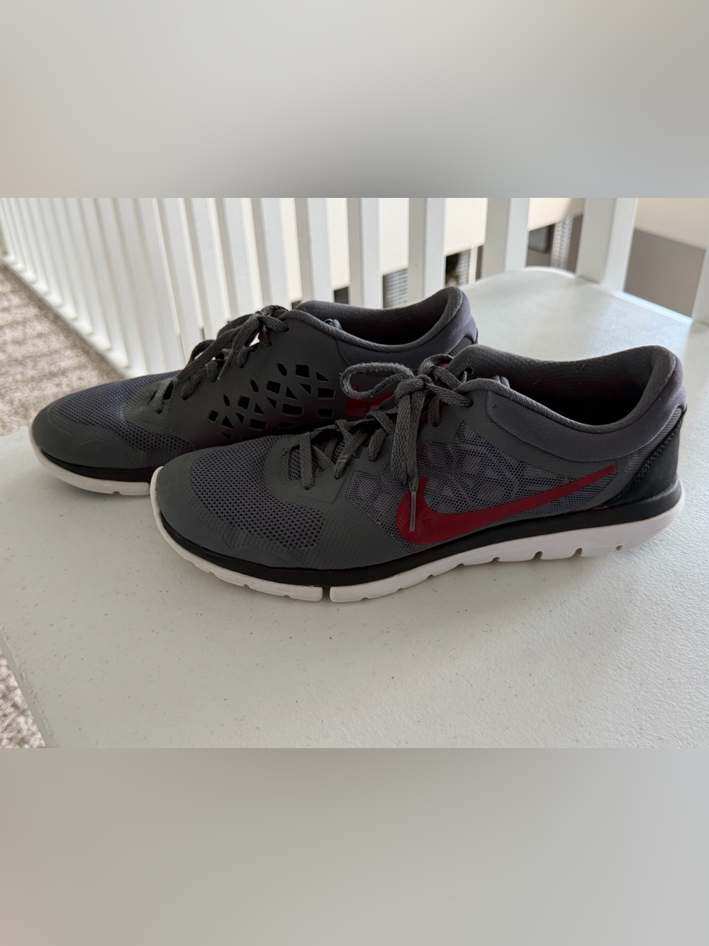 Nike Men’s Gray Athletic Shoes with Red Swoosh